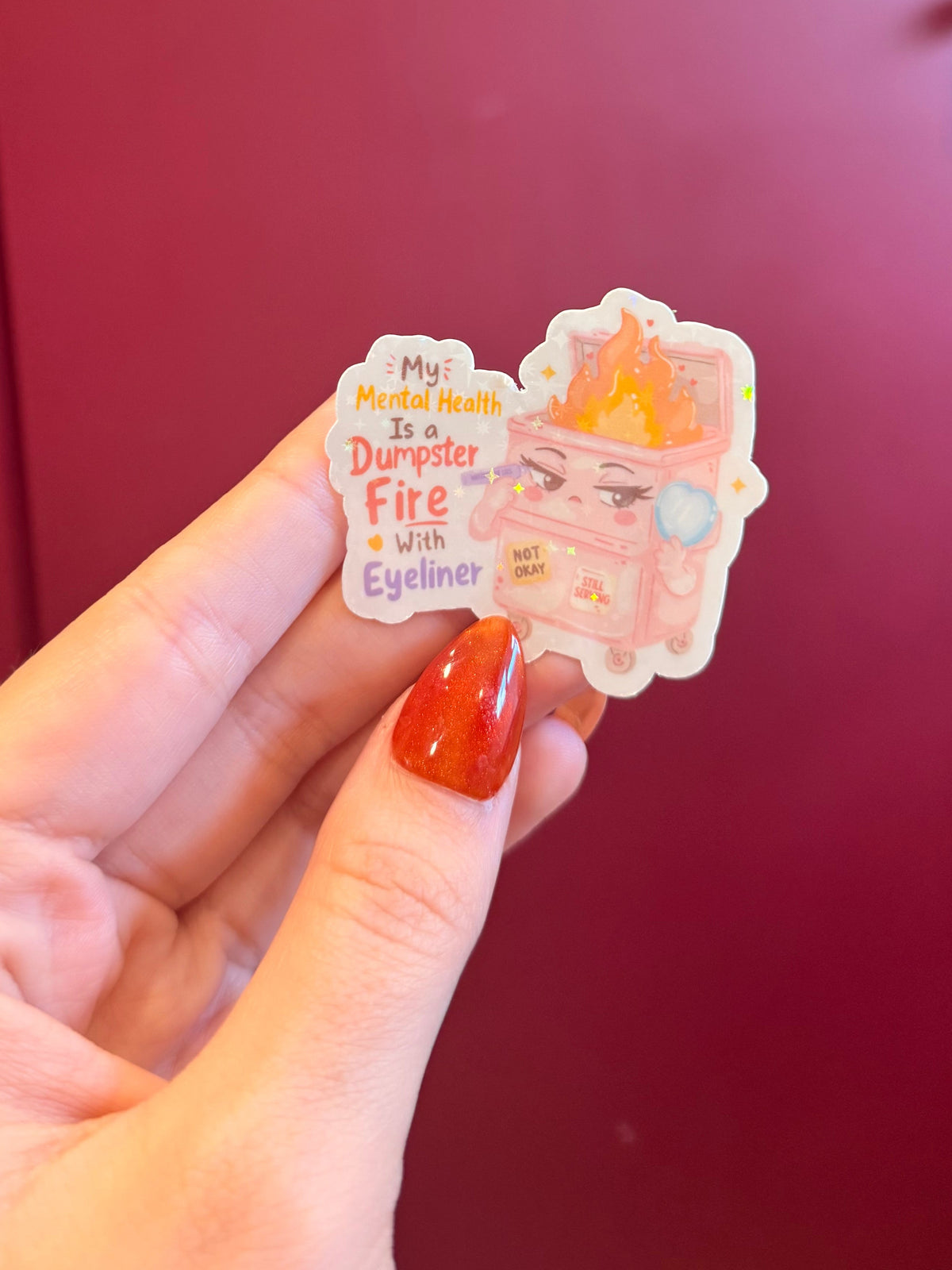 Dumpster fire with eyeliner